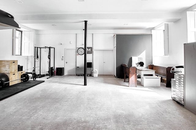 This 1,200 square foot room is currency being used as both a gym area and an office space, but could also function as a games room, or be converted into an annexe.