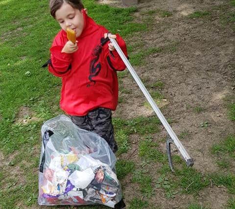 Mark's five-year-old grandson Chester was rewarded with an ice cream for his work tidying up Graves Park.