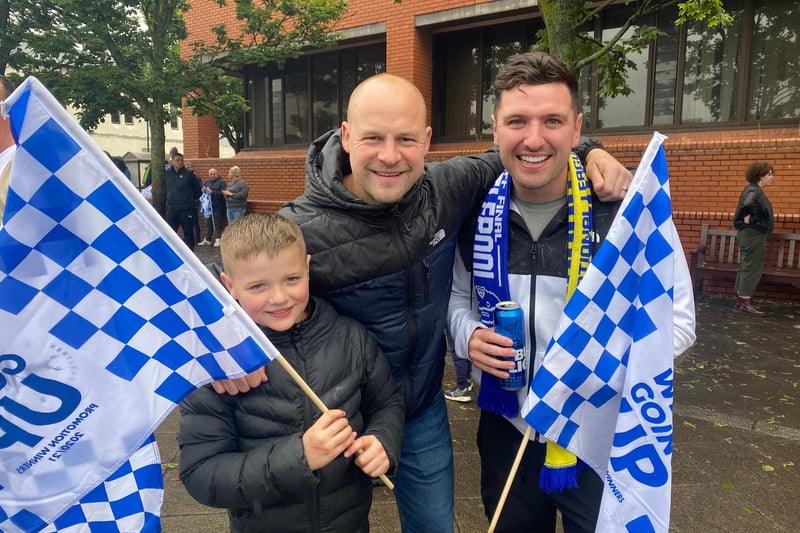 Fans turned out to show their support for the club. Connor Reed (right) with James Duffy and Hayden Duffy (10).