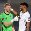 England goalkeeper Aaron Ramsdale greets England's Tyrone Mings after the final whistle during the FIFA World Cup Qualifying match at the San Marino Stadium, Serravalle. Nick Potts/PA Wire