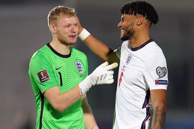 England goalkeeper Aaron Ramsdale greets England's Tyrone Mings after the final whistle during the FIFA World Cup Qualifying match at the San Marino Stadium, Serravalle. Nick Potts/PA Wire