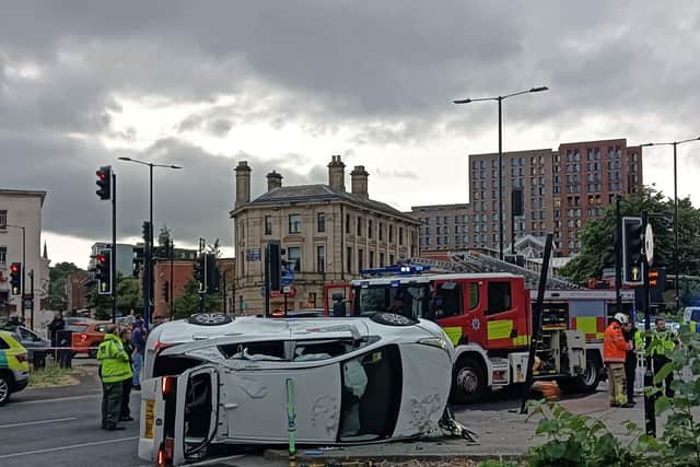 A car was flipped on its side in a three-vehicle collision on St Mary's Road this evening (June 28).