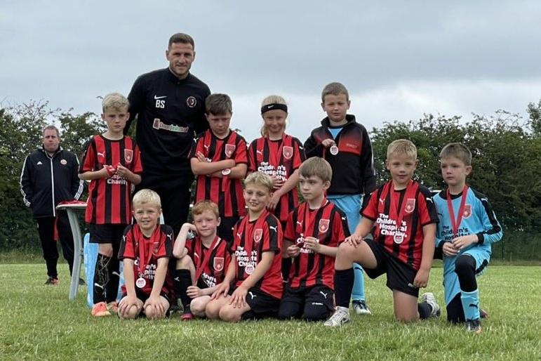 Billy Sharp's son Leo, back row, third from right, reacts after losing in the final of the LJS Cup on Sunday