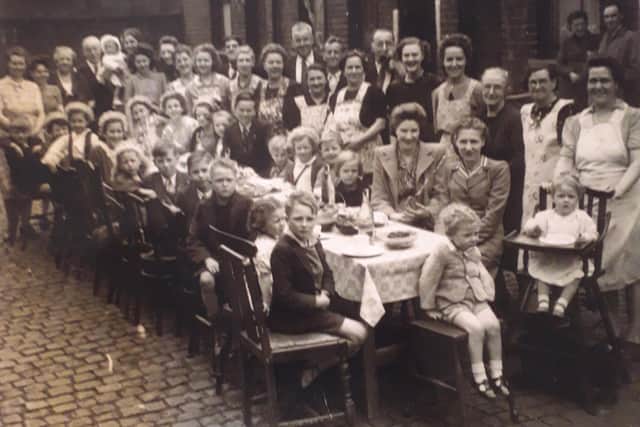 Julie Wilson sent in this photo of a party that she said was held on or near to Wood Street, Hillsborough. She said: "My father is the boy at the front, aged nine years - he is now 84. He is called Herbert Salvin."