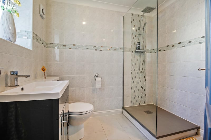 Modern, downstairs, three-piece shower room.