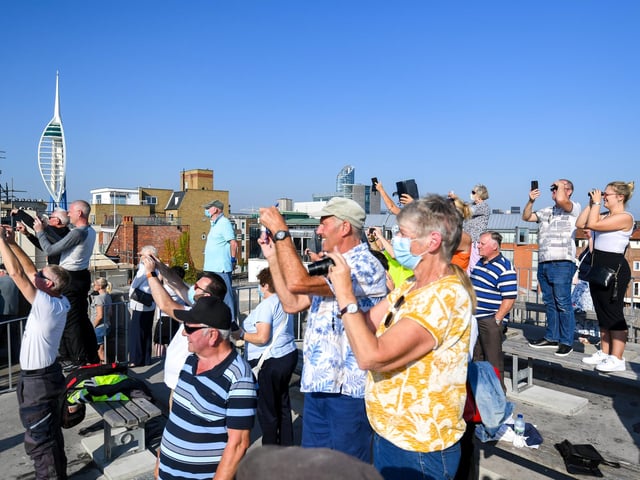 Crowds watch as HMS Queen Elizabeth departs from Portsmouth Naval base. Picture: Finnbarr Webster/Getty Images