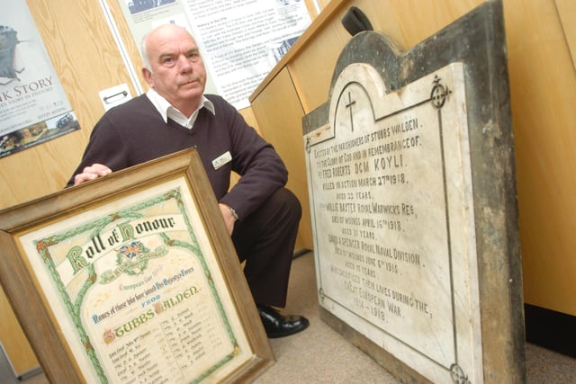 Doncaster Museum's visitor assistant Steve Tagg with the Walden Stubbs war memorial plaque which was donated by a farmer from the village