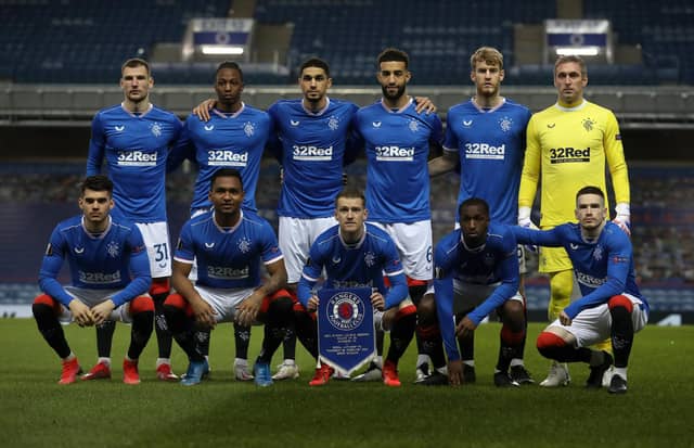 Rangers pose for a team photo ahead of the UEFA Europa League Round of 32 match between Rangers FC and Royal Antwerp FC at Ibrox Stadium on February 25, 2021. (Photo by Ian MacNicol/Getty Images)