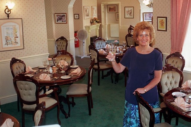 Wendy Woodhouse salutes the future of Peggotty's Restaurant, Langsett Road, Hillsborough, September 1999