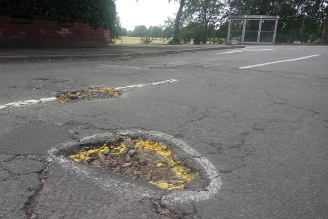 The potholes in Victorian Crescent.