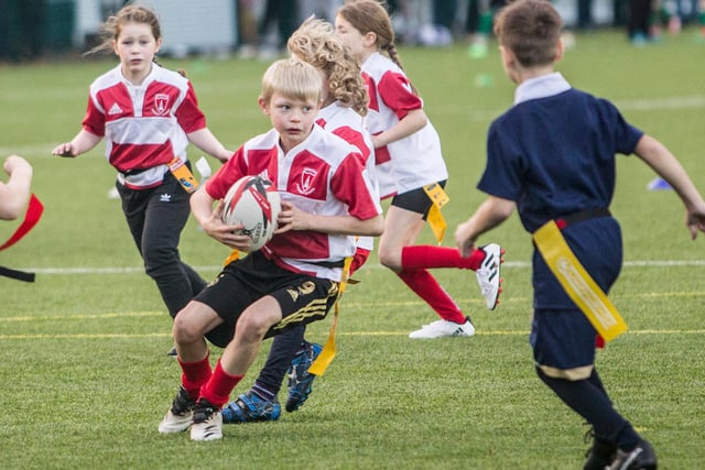 John Jeffrey in possession for Denholm Primary at Hawick's youth rugby festival