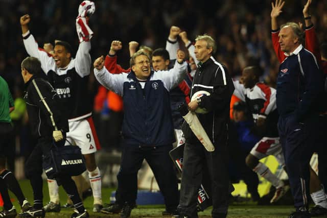 Sheffield United manager Neil Warnock (centre) leads the celebrations at the final whistle during the Nationwide League Division One play-off semi-final second leg match between Sheffield United and Nottingham Forest held on May 15, 2003 at Bramall Lane. Sheffield United won the match 4-3 after extra-time, winning the tie 5-4 on aggregate. (Photo by Laurence Griffiths/Getty Images)