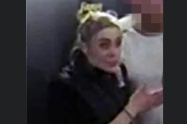 Police investigating a dog attack in a Sheffield pub have today issued CCTV pictures of a woman they want to identify.