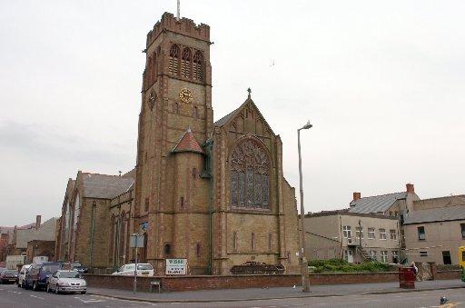Holy Trinity Church, on Dean Street, Blackpool. The Historic England register says the church is in poor condition with slow decay and has "issues with high level masonry on the tower".