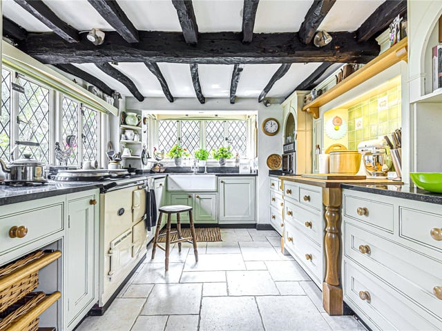 This three bedroom Grade II listed thatched cottage in Nether Wallop is on the market for £900,000. It is listed by Fine and Country.