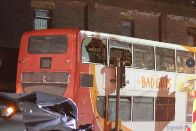 A bus and car were both damaged after a collision at the junction of West Street and Glossop Road in Sheffield city centre last night (Photo: Gina Kalsi)