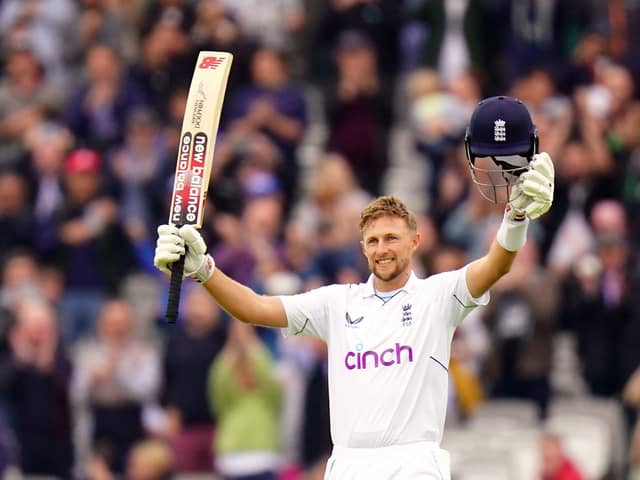 England's Joe Root celebrates reaching his century in the match and 10000 career Test runs as he bats during day four of the First LV= Insurance Test match at Lord's. Adam Davy/PA Wire.