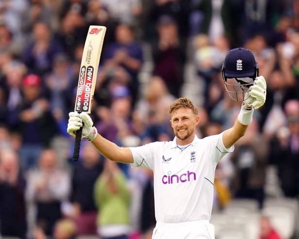 England's Joe Root celebrates reaching his century in the match and 10000 career Test runs as he bats during day four of the First LV= Insurance Test match at Lord's. Adam Davy/PA Wire.