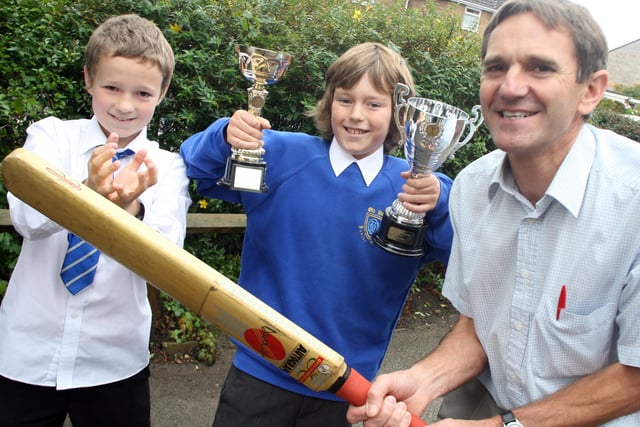 Old Hall teacher received a cricket award from Mike Gatting in 2008,  Steve Lawrence with pupils Christopher Thompson (left) and Jordan Reynolds.
