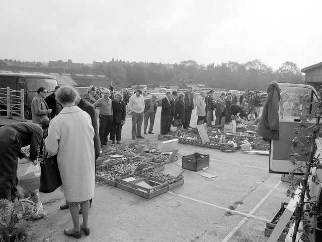 Fruit and vegetables were sold alongside the cattle - van you spot yourself amongst the eager shoppers?
