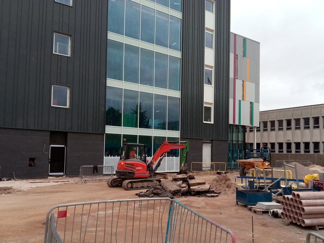 Workmen on the site of the Doncaster University Technical College, viewed from College Road
