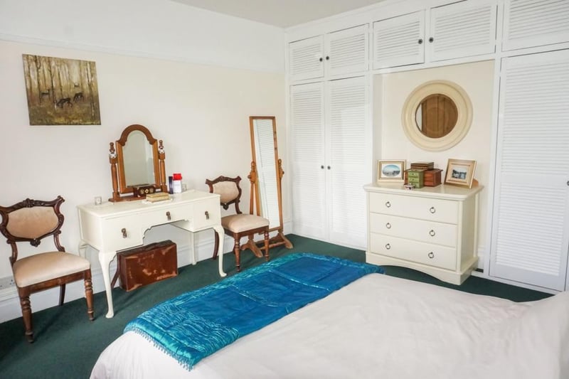 Spacious double bedroom with fitted wardrobes