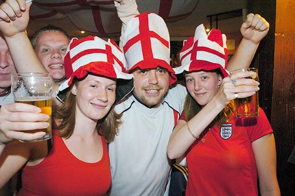 From left, Gemma Raynor, Andrew Fish and Dawn Simmons at the Sicey Hotel, Sheffield, during the England v Portugal Euros match, on June 24, 2004