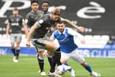 Aden Flint in action for Sheffield Wednesday before his loan spell was cut short.