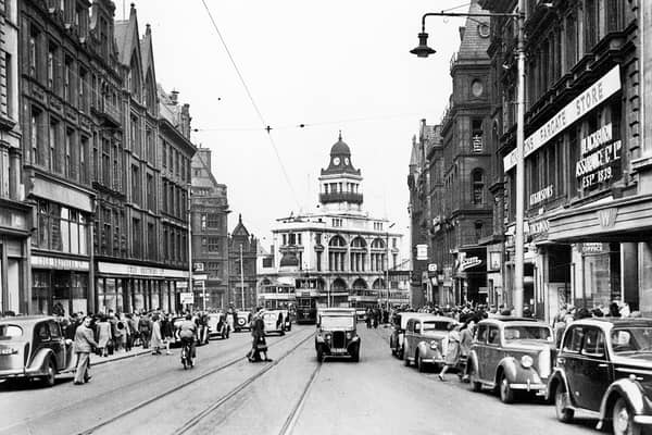 Fargate, Sheffield, May 10, 1947.  On the right of the picture is Atkinson's Fargate Store and on the left is Cole Brothers Department Store