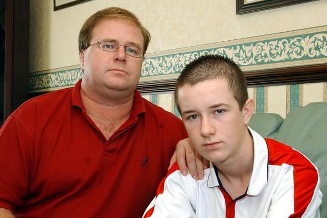 Paul (42) and Jamie Clamp (15) photographed in their home in Balby in 2004.