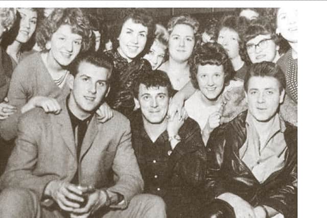 Eddie Cochran (front right) meets fans from The Star’s Teenage Club with Gene Vincent (front middle) and Vince Eager (front left).