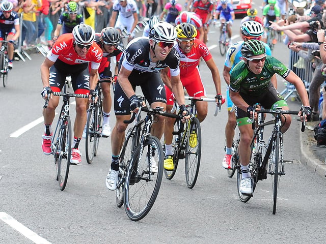 Grit and determination shows on the faces of the peloton as they tackle the steepest part of Jenkin Road, Wincobank