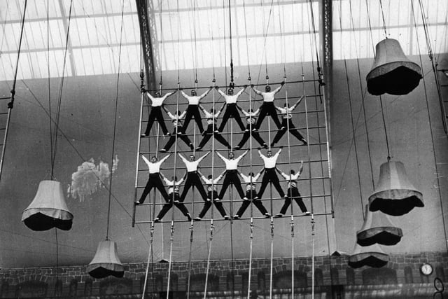 15th May 1934:  Cadets of the Rayal Naval School, Portsmouth, rehearsing the rope-climbing exhibition at Olympia, London, which they will perform at the Royal Naval and Military Tournament.  (Photo by E. Dean/Topical Press Agency/Getty Images)