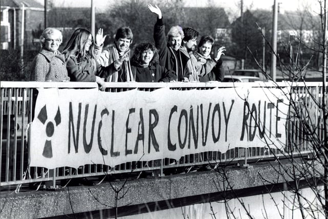 Yorkshire CND branch members hold up a protest banner on the A1 in December 1986