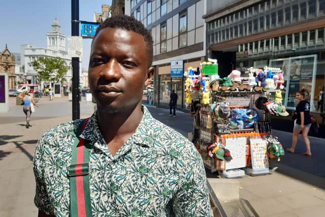 Street vendor Mamadou Sene said business selling hats, badges and gifts was ‘very slow’.