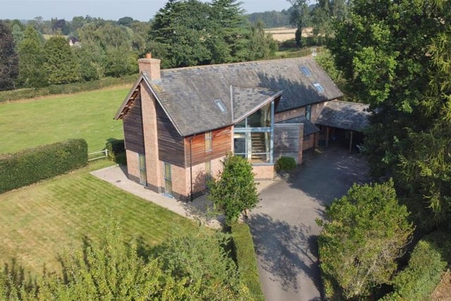 The first of several photos showing drone footage of the Windmill Hill property. As you can see, it is very much an individual home, surrounded by open countryside.