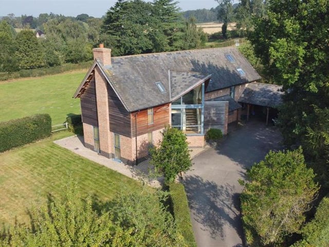 The first of several photos showing drone footage of the Windmill Hill property. As you can see, it is very much an individual home, surrounded by open countryside.