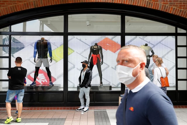 Shoppers wearing face masks at Gunwharf Quays in Portsmouth