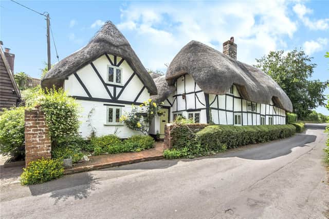 This three bedroom Grade II listed thatched cottage in Nether Wallop is on the market for £900,000. It is listed by Fine and Country.