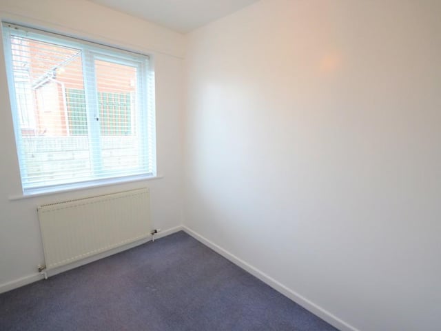 Bedroom 3 - A well presented single bedroom with a nice view of the rear garden from a UPVC double glazed window with fitted venetian blind, power socket and a central heating radiator.