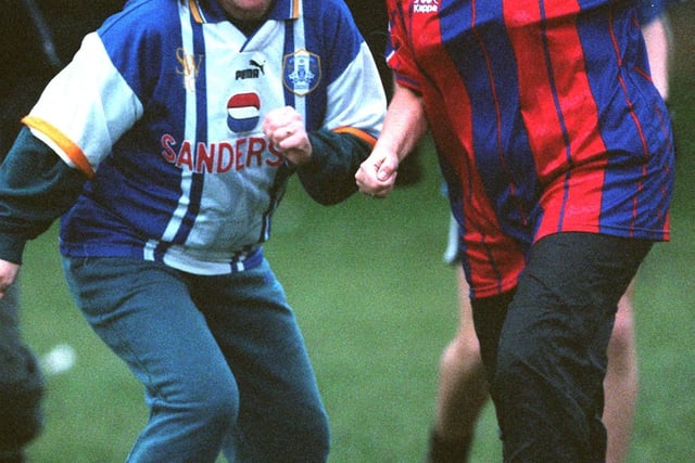 Firth Park School held a Fun 5-a-Side Competition between Staff & pupils in memory of Former pupil John Ashton who was killed by a car. Pictured is Head Teacher Maureen Laycock(left) getting stuck into the action, c.1998