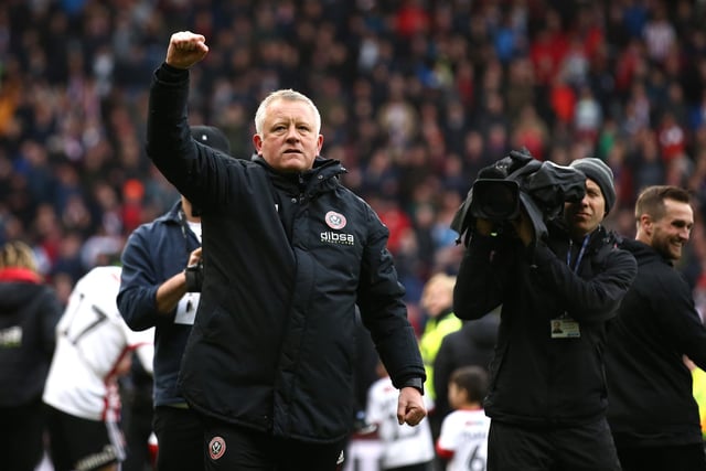 The United boss acknowledges jubilant supporters on the Kop after victory over Ipswich Town at the Lane in April 2019 all-but seals promotion to the Premier League.