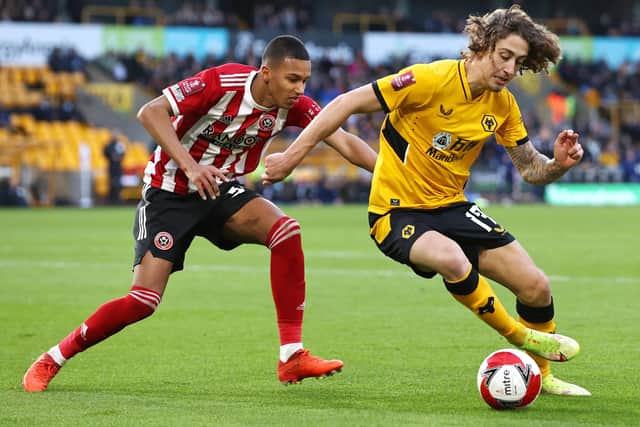 Fabio Silva of Wolverhampton Wanderers is closed down by Kyron Gordon of Sheffield United (Mark Thompson/Getty Images)