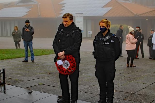 Neil Priestley and Julie Meaney - representing Mansfield police showing respect at Mansfield's Remembrance Day service. Picture: Melvyn Pearce/Royal British Legion