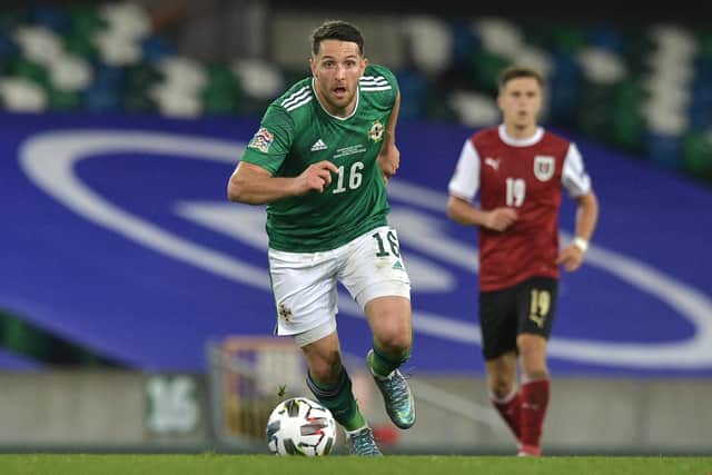 Northern Ireland striker Conor Washington became Rotherham United's first signing of the summer