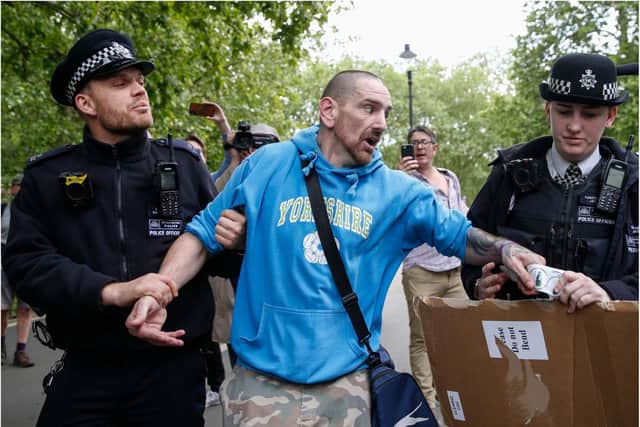 Phillip Hartley is arrested in London. (Photo: Getty).