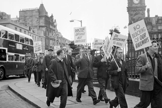 Dr Beeching demonstration - Demonstrators march down Waverley Bridge with slogans ontheir way to meet Dr Beeching - Railway. Protesting against rail cuts.
