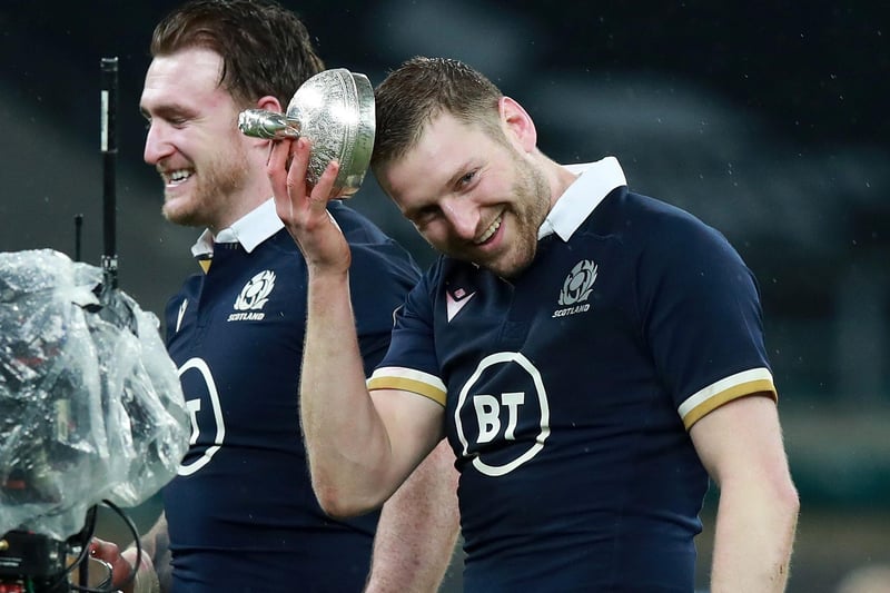 Finn Russell of Scotland poses with the Calcutta Cup following his side's victory in the Guinness Six Nations match between England and Scotland at Twickenham Stadium today. (Photo by David Rogers/Getty Images)