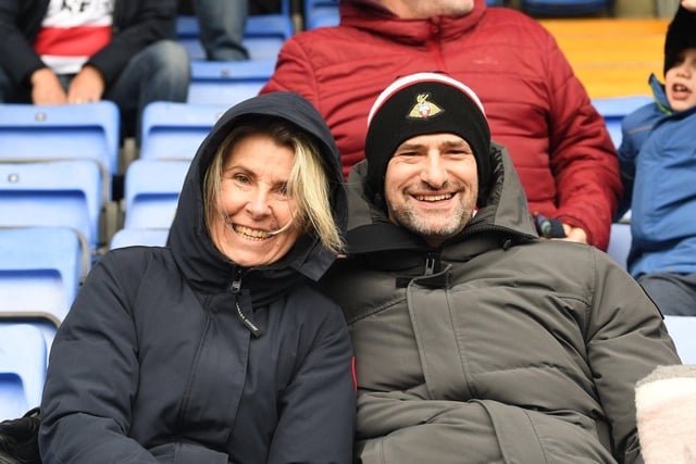 Two Rovers fans wrap up warm against the cold.
