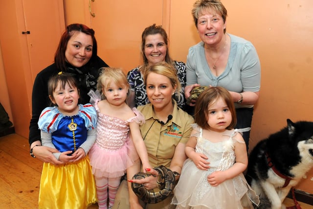 Elaine Burridge of Zoo Academy, with playgroup organisers Sarah Briggs, Alison Coldwell and Julie Davies and some of the children at the St Peter's Church, Harton Village, playgroup seven years ago.